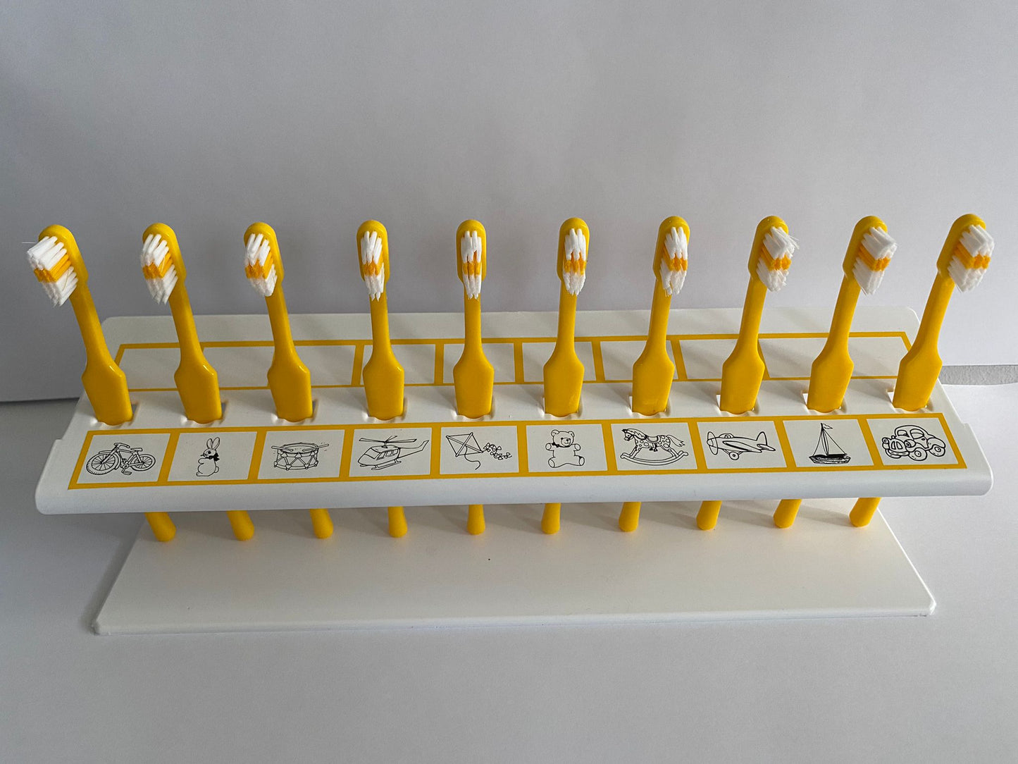 Toothbrush Rack with Toy symbols